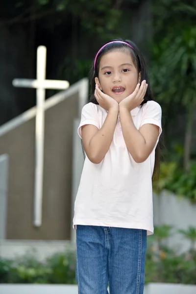 Surprised Filipina Child And Cross — Stock Photo, Image