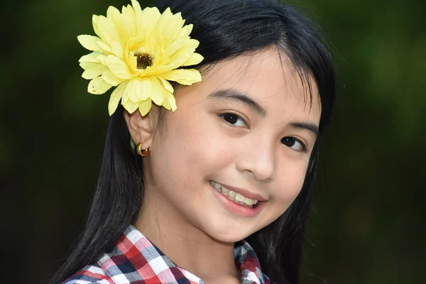 Youthful Diverse Girl Smiling With Flowers