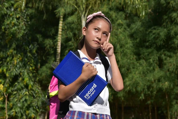 Girl Student Making A Decision With Books