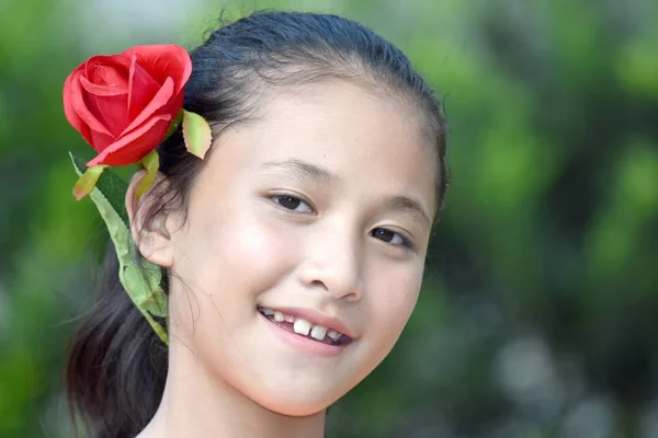 Pretty Diverse Female Smiling With A Rose — Stok Foto