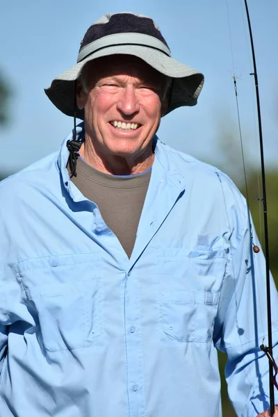 Pescador com pesca Rod — Fotografia de Stock