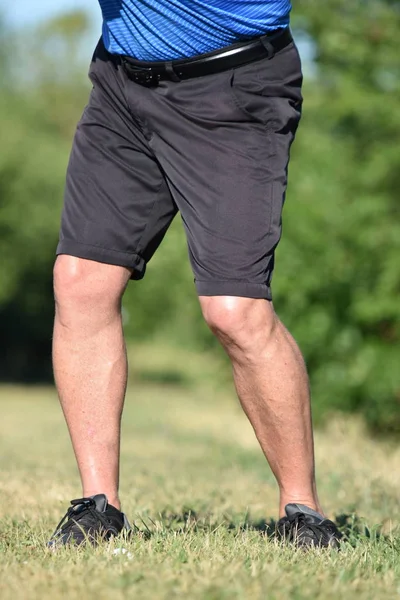 Legs Of Older Male Golfer