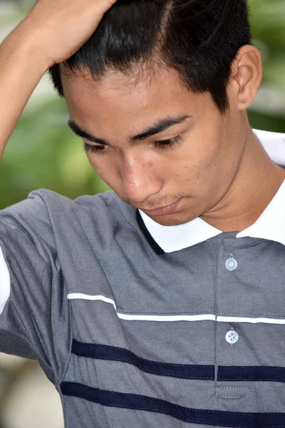 Молоді філіппінський чоловіки і смуток — стокове фото