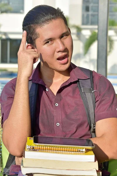 Creativo guapo minoría chico estudiante con libros —  Fotos de Stock