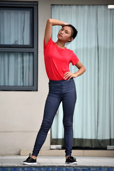 Serious Asian Teenage Female Standing By Condo — Stock Photo, Image