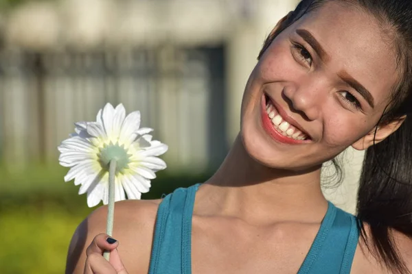 Smiling Asian Female With Flower