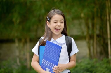 Çeşitli Öğrenci Çocuk Kitaplar ile Komik Yüzler yapma