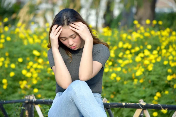 Stressed Young Asian Female