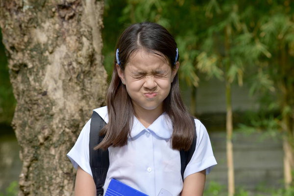 Anxious Catholic Filipina Person Wearing Uniform
