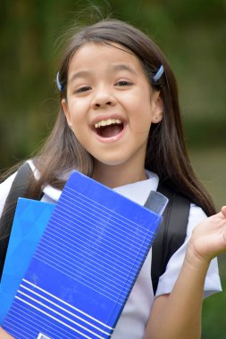Kitaplar ile mutlu okul kız