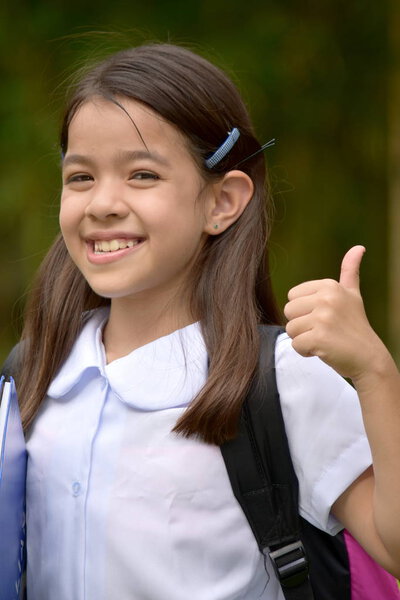 Happy Young Minority Student Child Wearing Uniform With Books