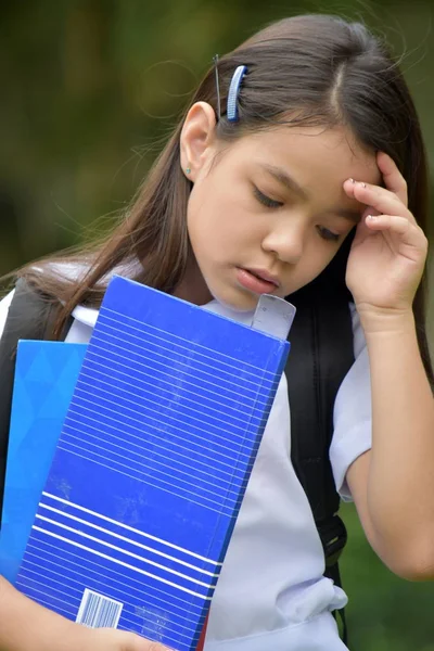 Sad School Girl Wearing School Uniform With Notebooks