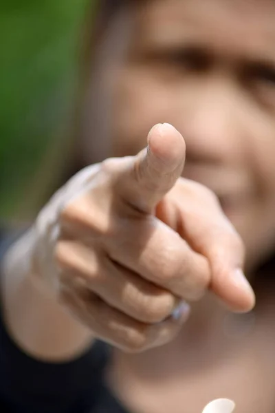 A Female Senior Pointing — Stock Photo, Image