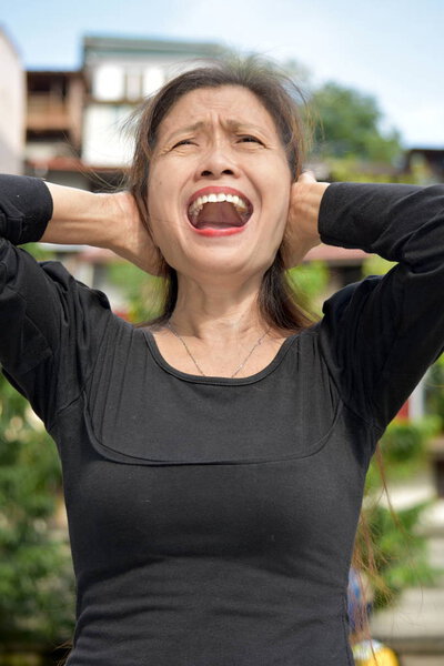 An Anxious Female Senior Granny