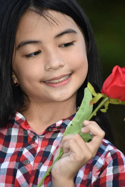 Smiling Beautiful Diverse Girl With Flower