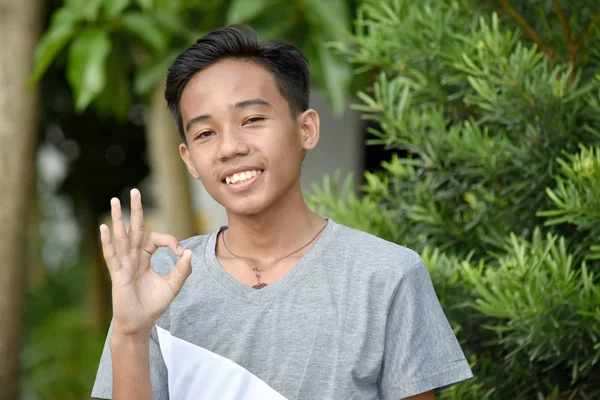 A Filipino Juvenile And Okay Sign — Stok Foto