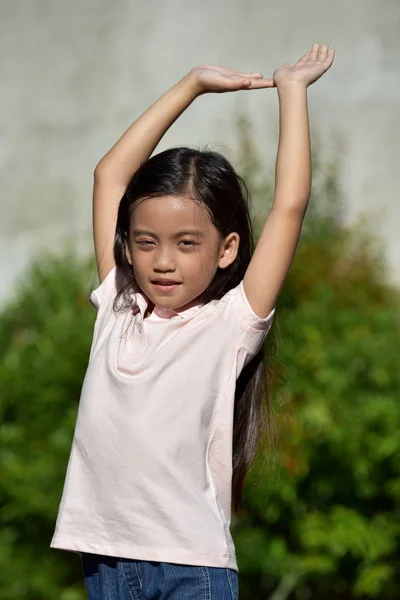 A Stretching Petite Filipina Female — ストック写真