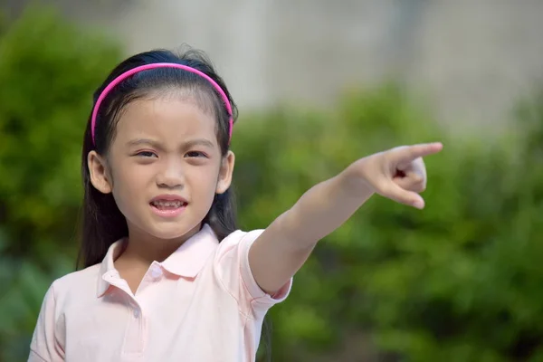 A Diverse Girl Pointing — стоковое фото