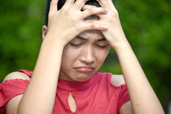 A Filipina Female Under Stress
