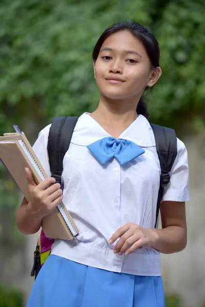 An Unemotional Youthful Asian Female Student — Stock Photo, Image