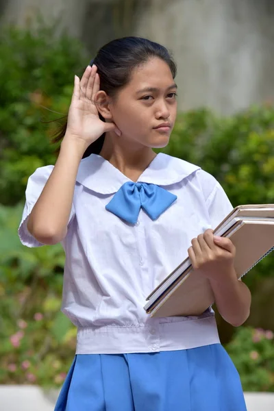 An A Listening Filipina Female Student — Stock Photo, Image