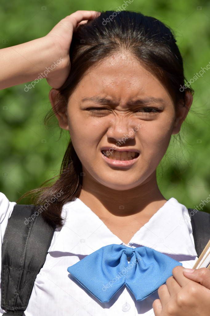 Cute Asian Girl Student And Confusion