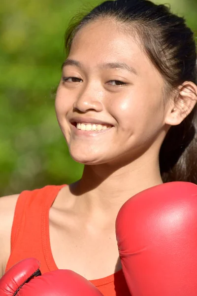 A Smiling Fitness Asian Female Athlete