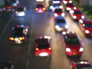 Trafik sıkışıklığı şehrin ışıkları bokeh arka plan