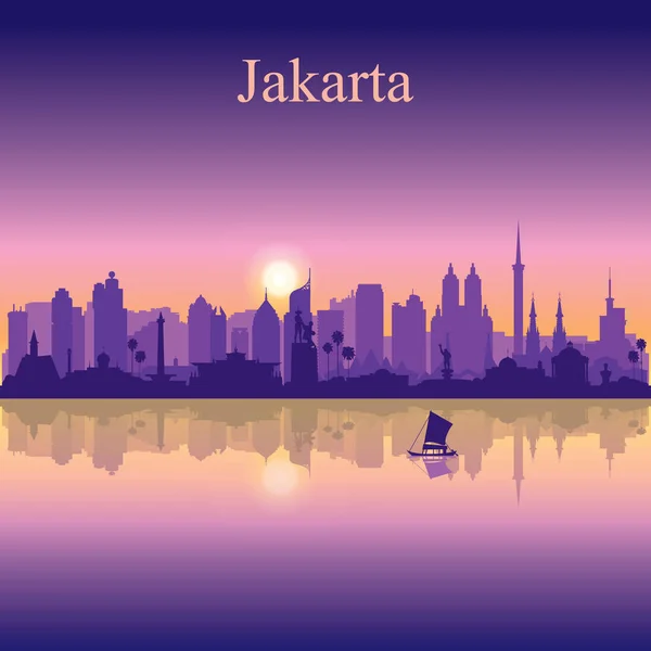 Jakarta città silhouette su sfondo tramonto — Vettoriale Stock