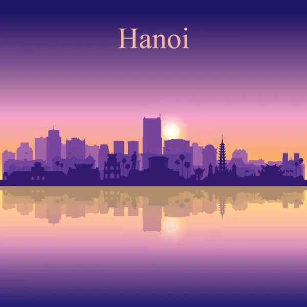 Hanoi città silhouette su sfondo tramonto — Vettoriale Stock