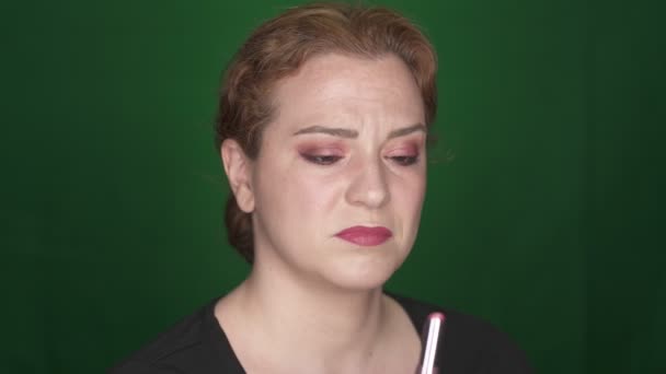 Woman Trying Lipstick Good Shot Green Background — Stock Video