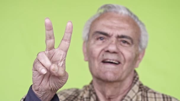 Senior Elderly Happy Man Making Victory Sign Close Slow Motion — Stock Video