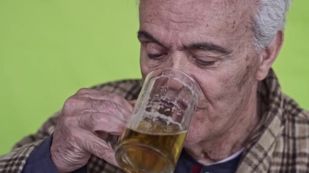 Senior Elderly Man Drinking Beer Close Slow Motion Video — Stock Video