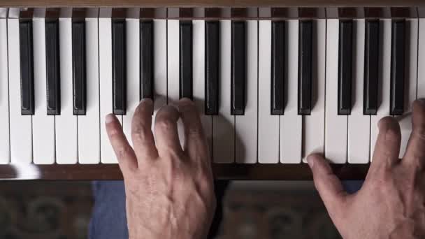 Musician Plays Piano Slow Motion Top View Medium Shot Shallow — Stock Video