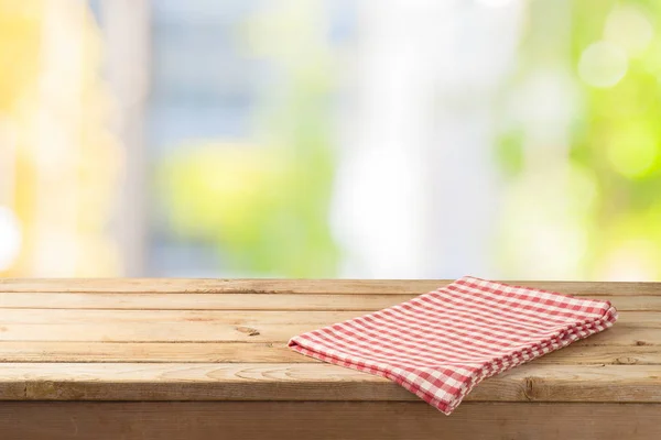 Leerer Holztisch Mit Tischdecke Über Abstraktem Bokeh Hintergrund Attrappe Für — Stockfoto