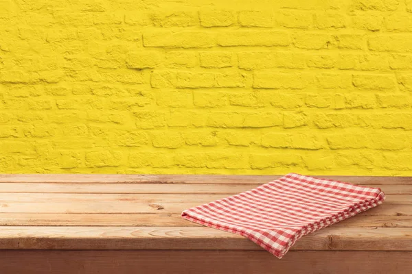 Empty Wooden Table Tablecloth Yellow Brick Stone Wall Background Can — Stock Photo, Image