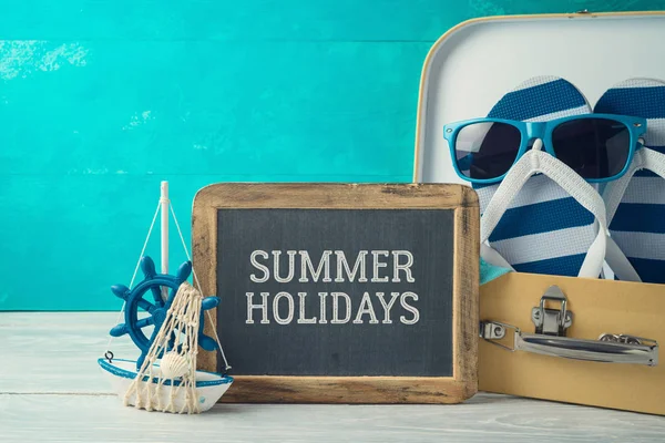 Summer concept background with cute funny flip flops, suitcase a — Stock Photo, Image