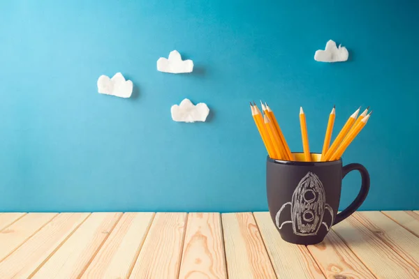 Back to school background with pencils and rocket chalkboard ske — Stock Photo, Image