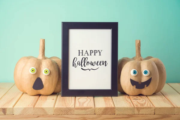 Halloween holiday concept with cute funny pumpkin decor and phot — ストック写真