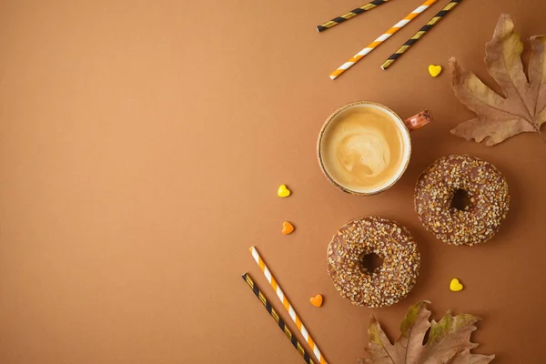 Coffee cup and donuts. Autumn party concept background.