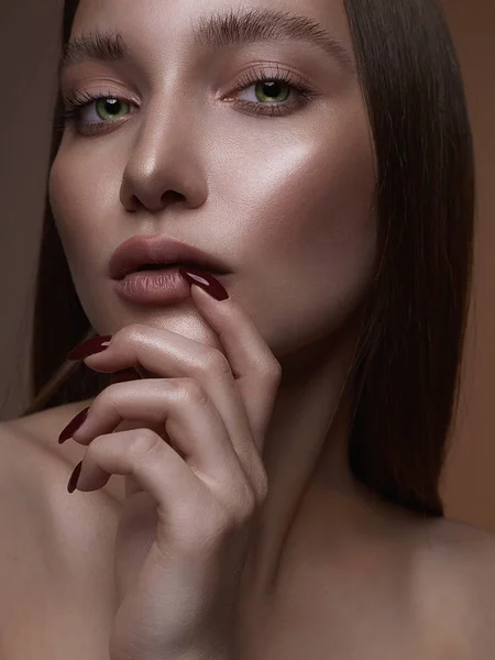bronze skin Beautiful woman face. sensual amazing model girl with beautiful make-up. beauty fashion portrait. wet makeup