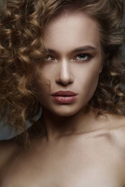 Beautiful woman. amazing curly girl with make-up clipart