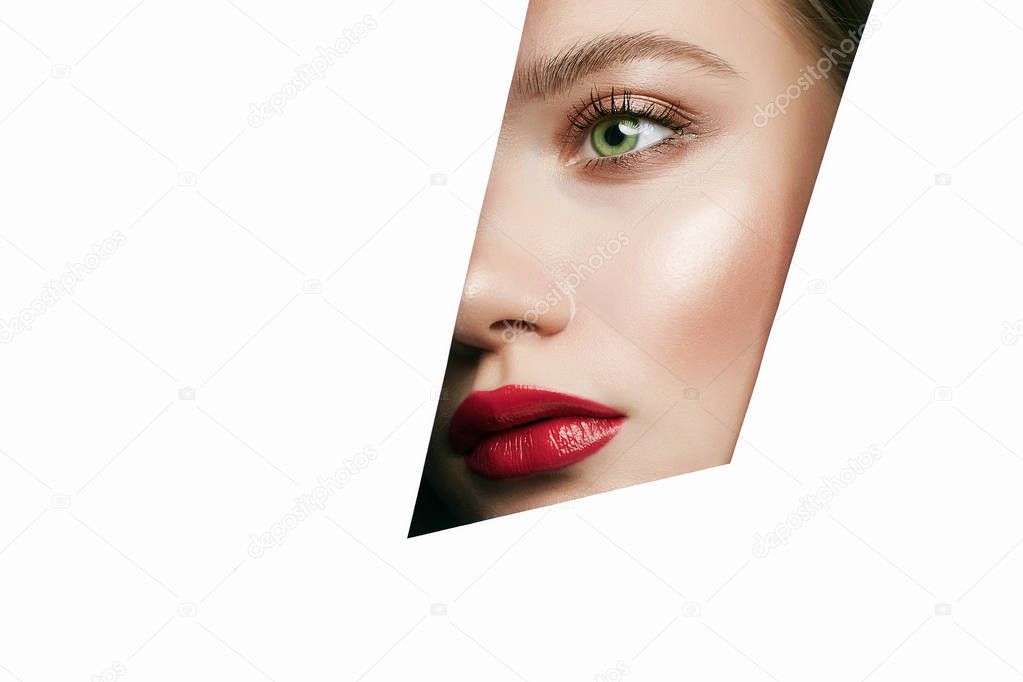 Face of beautiful woman with a bright makeup
