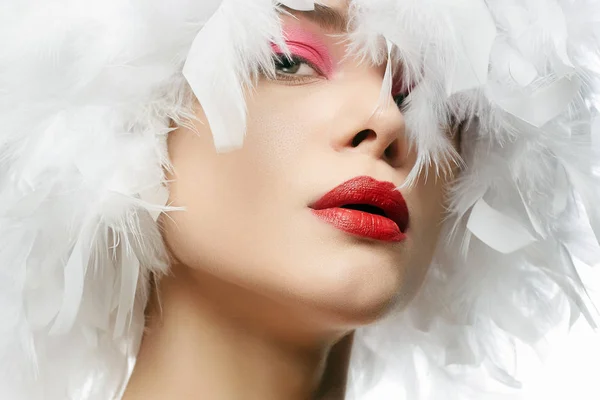 Beautiful Girl in white feathers. young woman — Stock Photo, Image