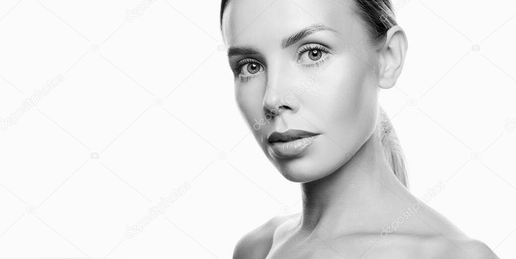 Beauty Woman face Black and white Portrait. Beautiful Spa model Girl with Perfect Fresh Clean Skin. Isolated on a white background