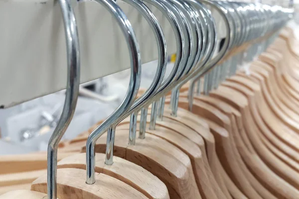 Many Wooden Hangers Clothes Stacked Store Rack — Stock Photo, Image