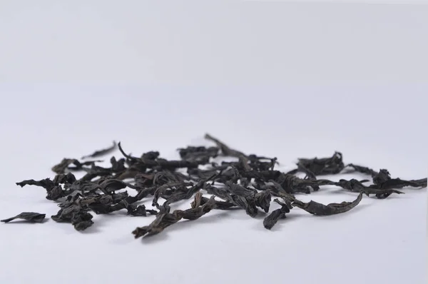 Çin siyah çay. Kuru çay yaprağı. Çin çay ürün fotoğraf. Çay ve infüzyon. Kuru çay yığını.