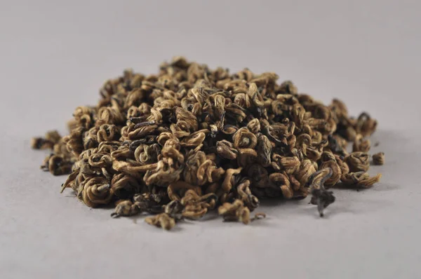 Çin siyah çay. Kuru çay yaprağı. Çin çay ürün fotoğraf. Çay ve infüzyon. Kuru çay yığını.