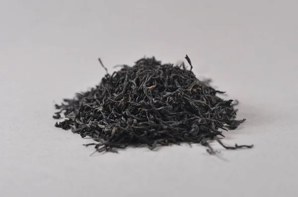 Çin siyah çay. Kuru çay yaprağı. Çin çay ürün fotoğraf. Çay ve infüzyon. Kuru çay yığını.