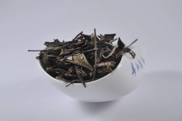 Çince çay çay ware. Kuru çay yaprağı. Çin çay ürün fotoğraf. Çay ve infüzyon. Kuru çay yığını.